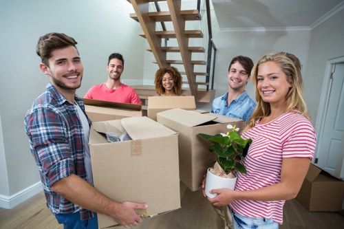 Moving boxes ready for home moves in Swisscottage