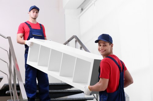 Team completing a risk assessment before loading furniture