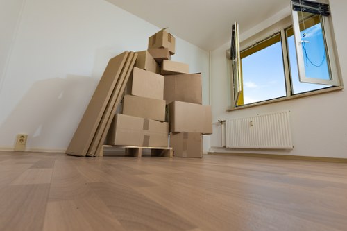 Careful loading of student belongings for a Swiss Cottage relocation
