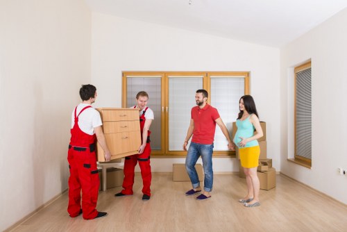 Professional movers handling student belongings in Swisscottage